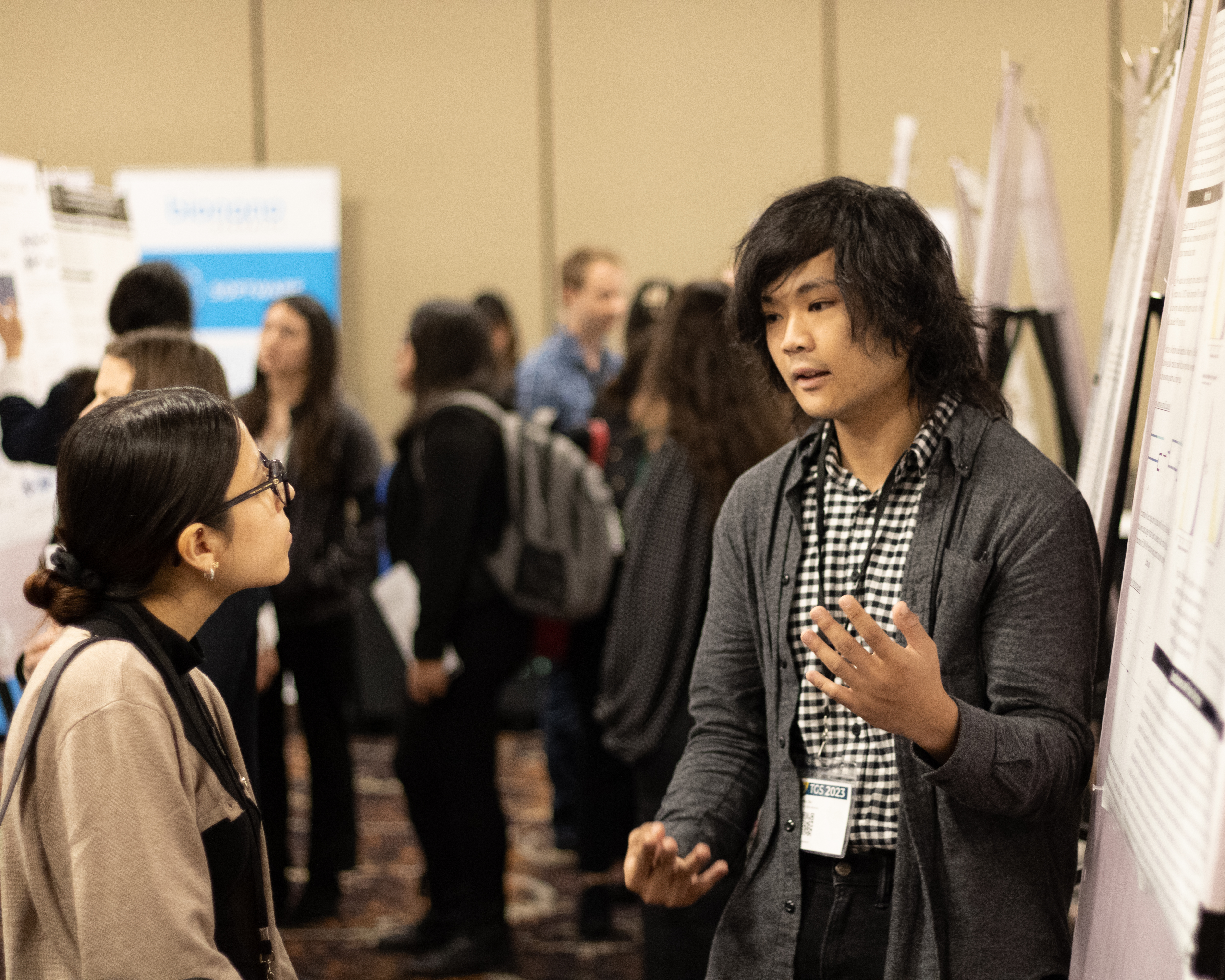 Max presenting a poster